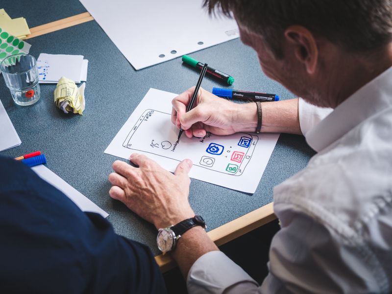 Designer developing a mobile app prototype