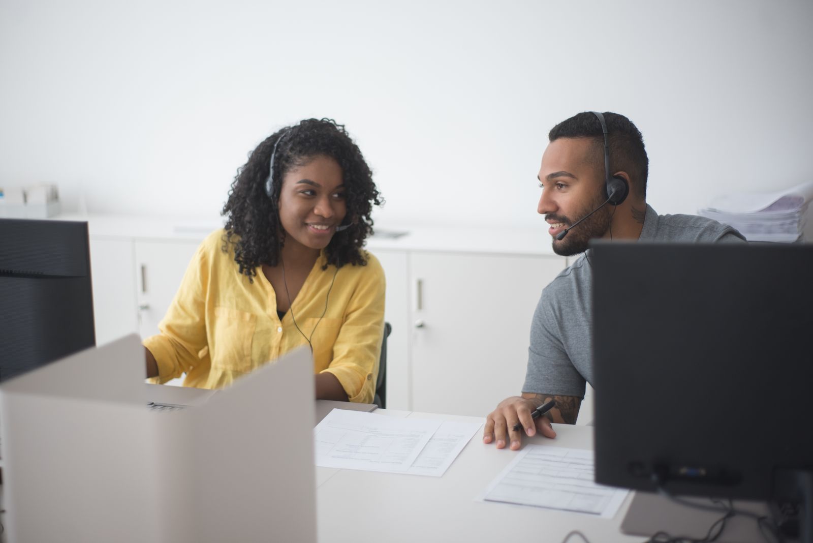 Technology consultant working with a client